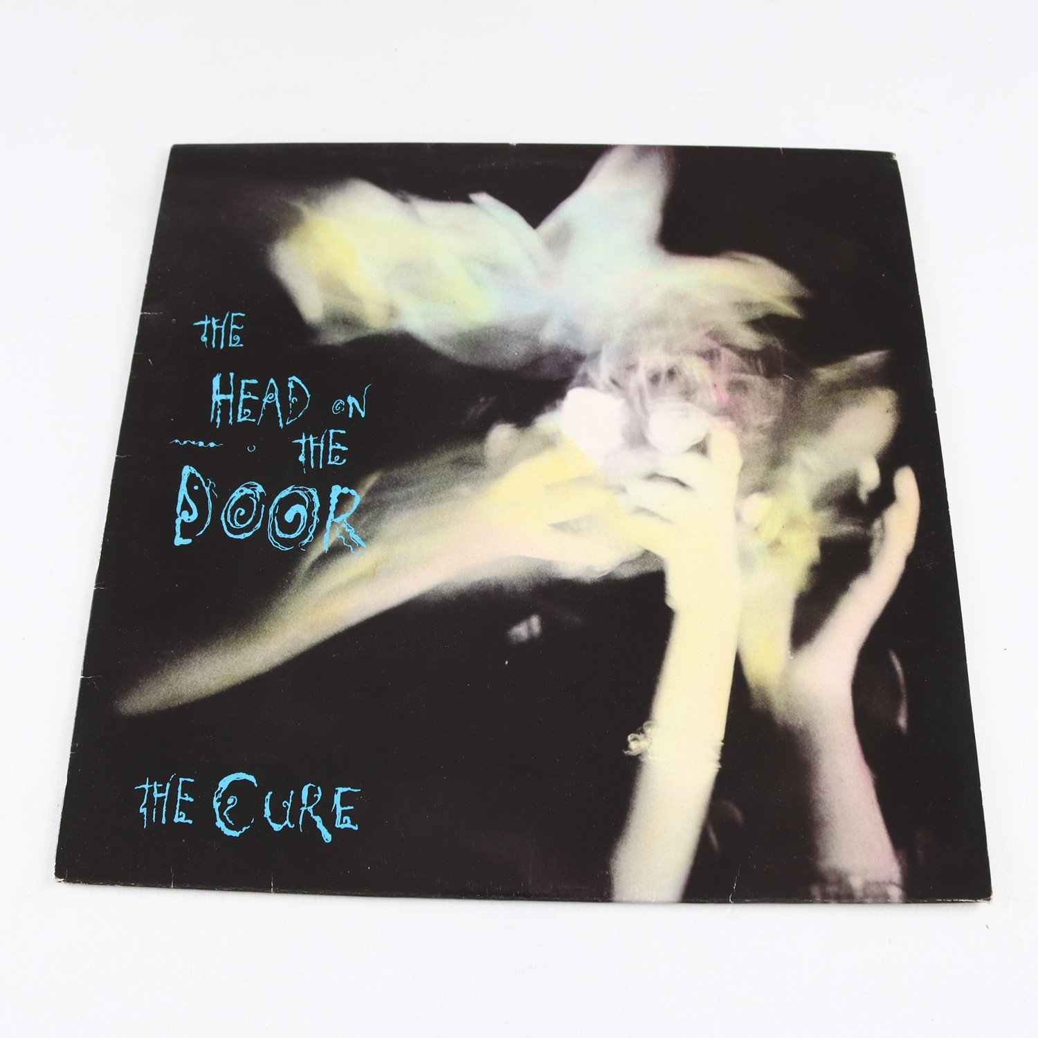 LP The Cure-Head on the door