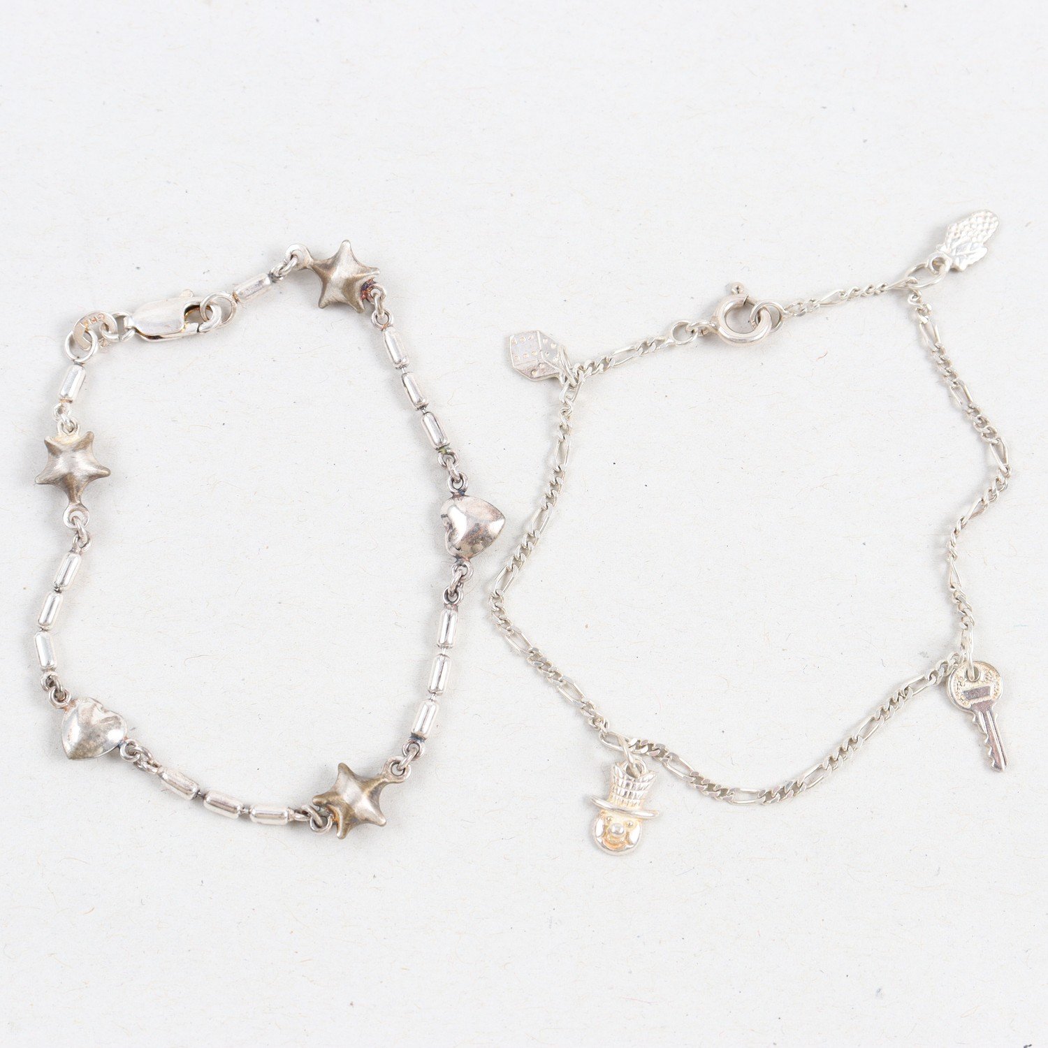 Armband, 2st, Silver, Berlocker, Vikt: 6,6g