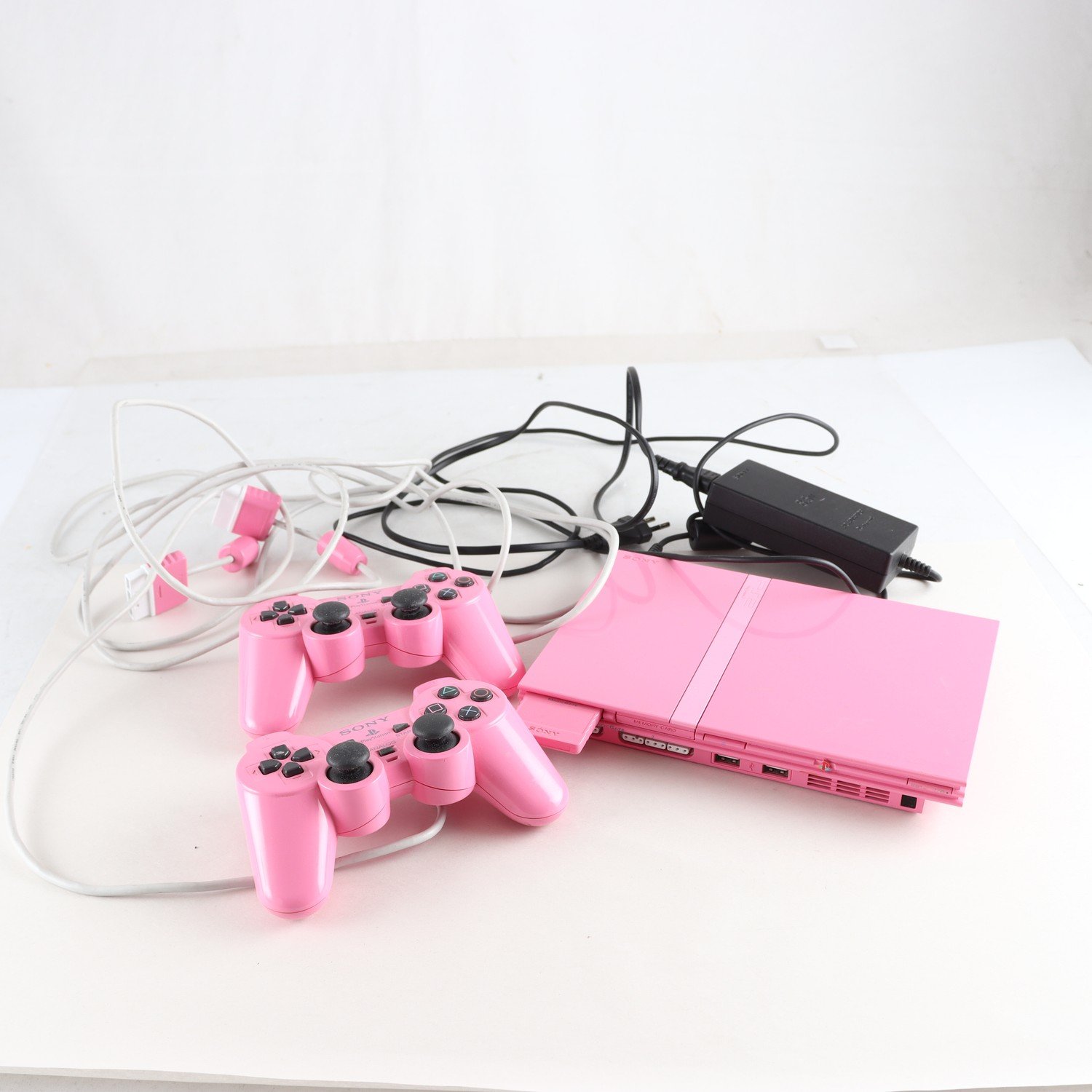 Spelkonsol, Playstation 2, slim pink. Samfraktas ej